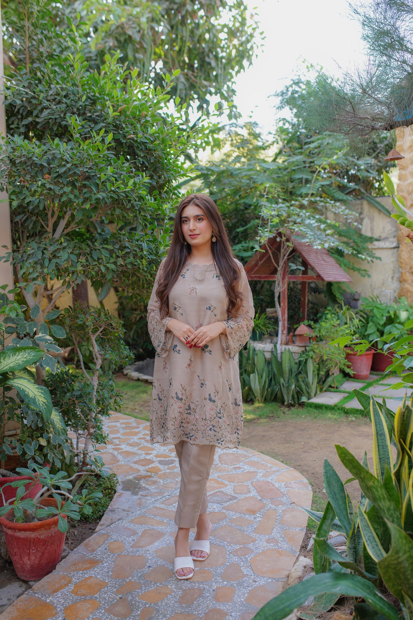 Elegant beige floral embroidered dress for women – modern and modest outfit with intricate details, perfect for casual and semi-formal occasions. Shop trendy and stylish dresses online.