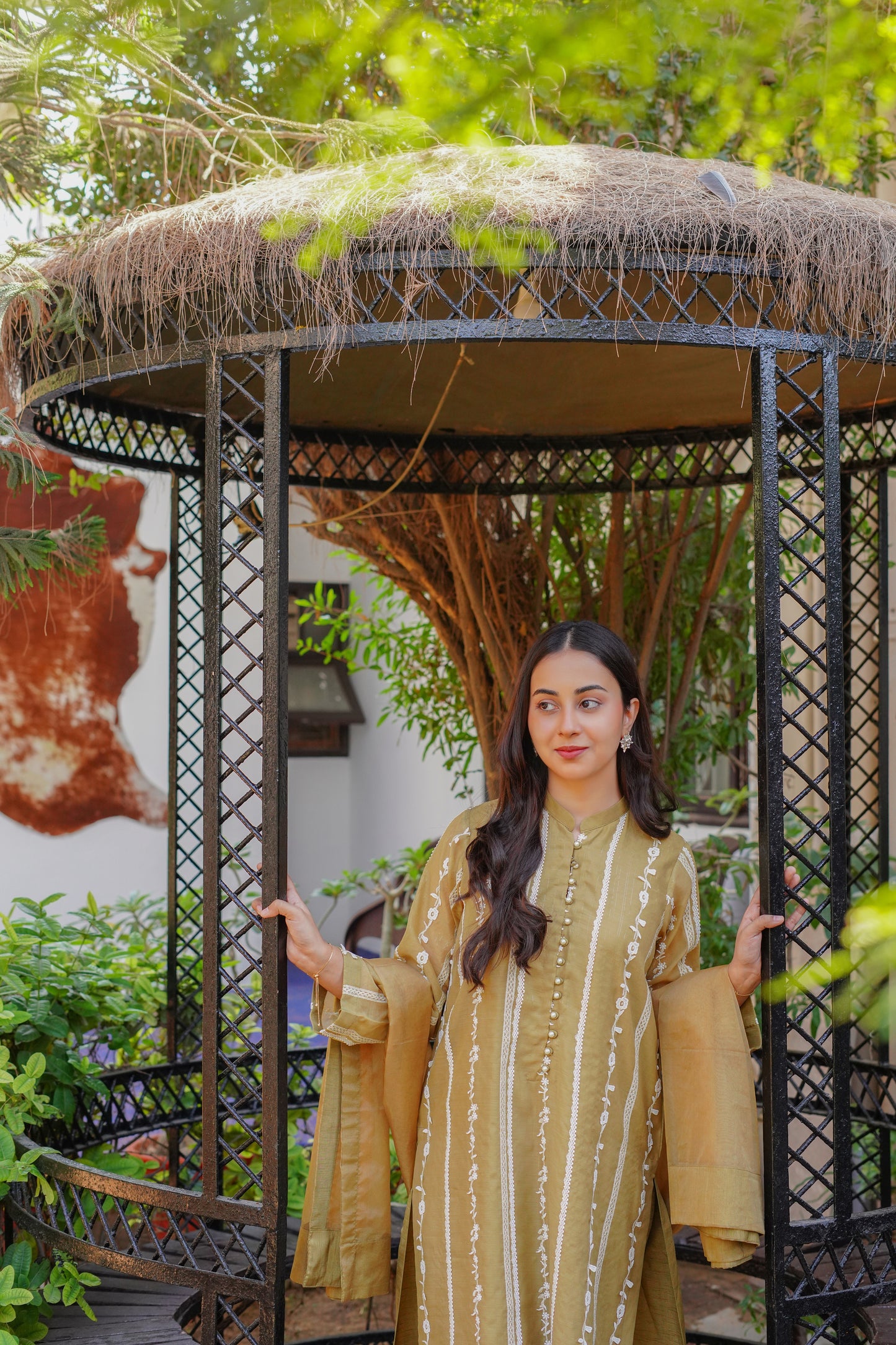 Chic mustard-yellow embroidered dress for women – stylish and modest outfit with vertical patterns, paired with matching pants and dupatta. Perfect for casual, formal, and festive wear. Shop modern modest clothing online.