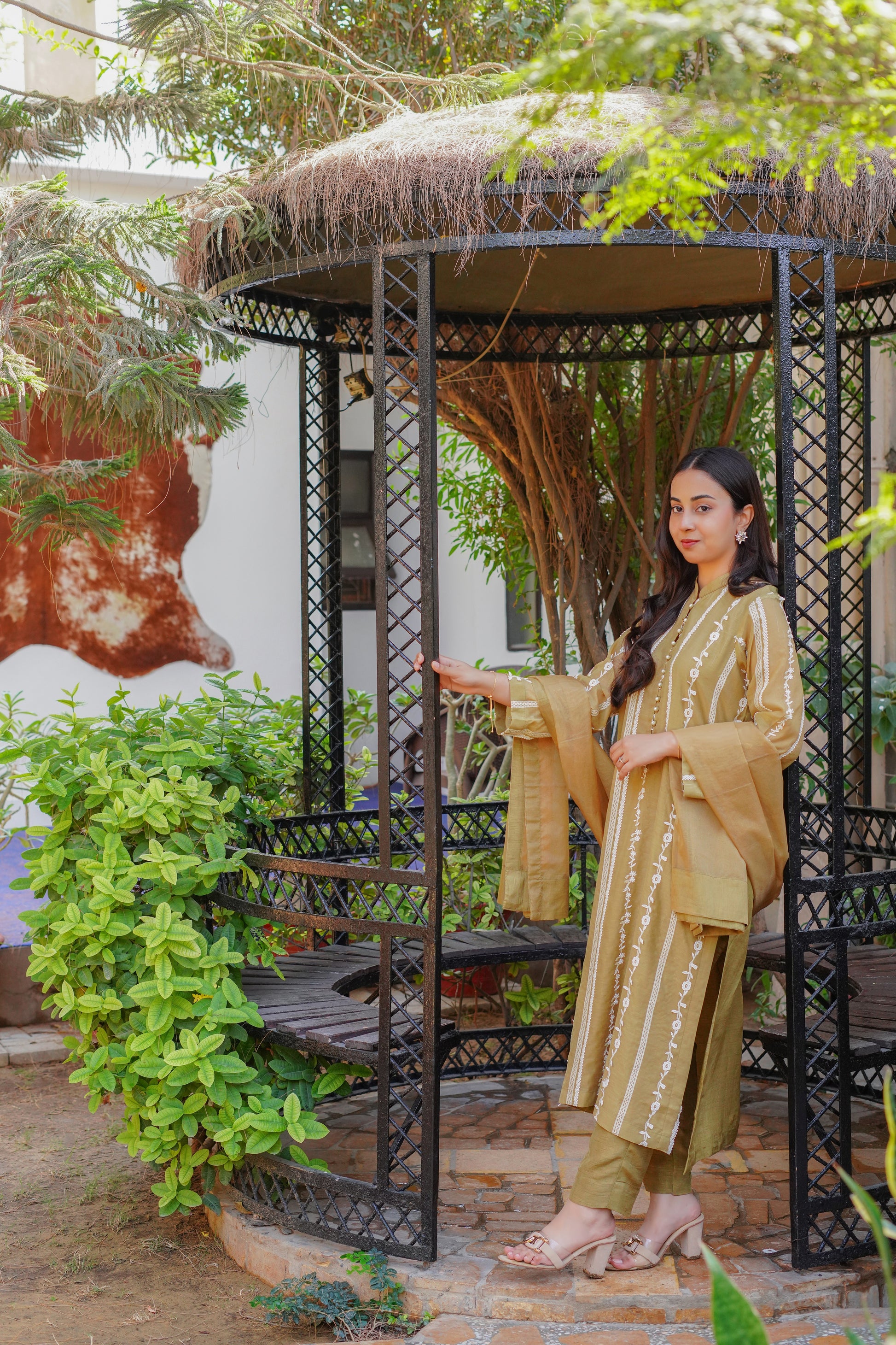 Chic mustard-yellow embroidered dress for women – stylish and modest outfit with vertical patterns, paired with matching pants and dupatta. Perfect for casual, formal, and festive wear. Shop modern modest clothing online.