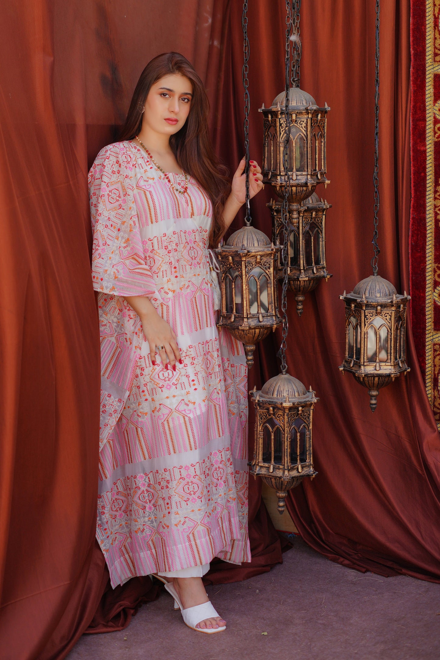 Elegant pink and white printed maxi dress for women – modern and modest outfit with intricate patterns, perfect for casual gatherings and festive occasions. Shop trendy and stylish women's dresses online.