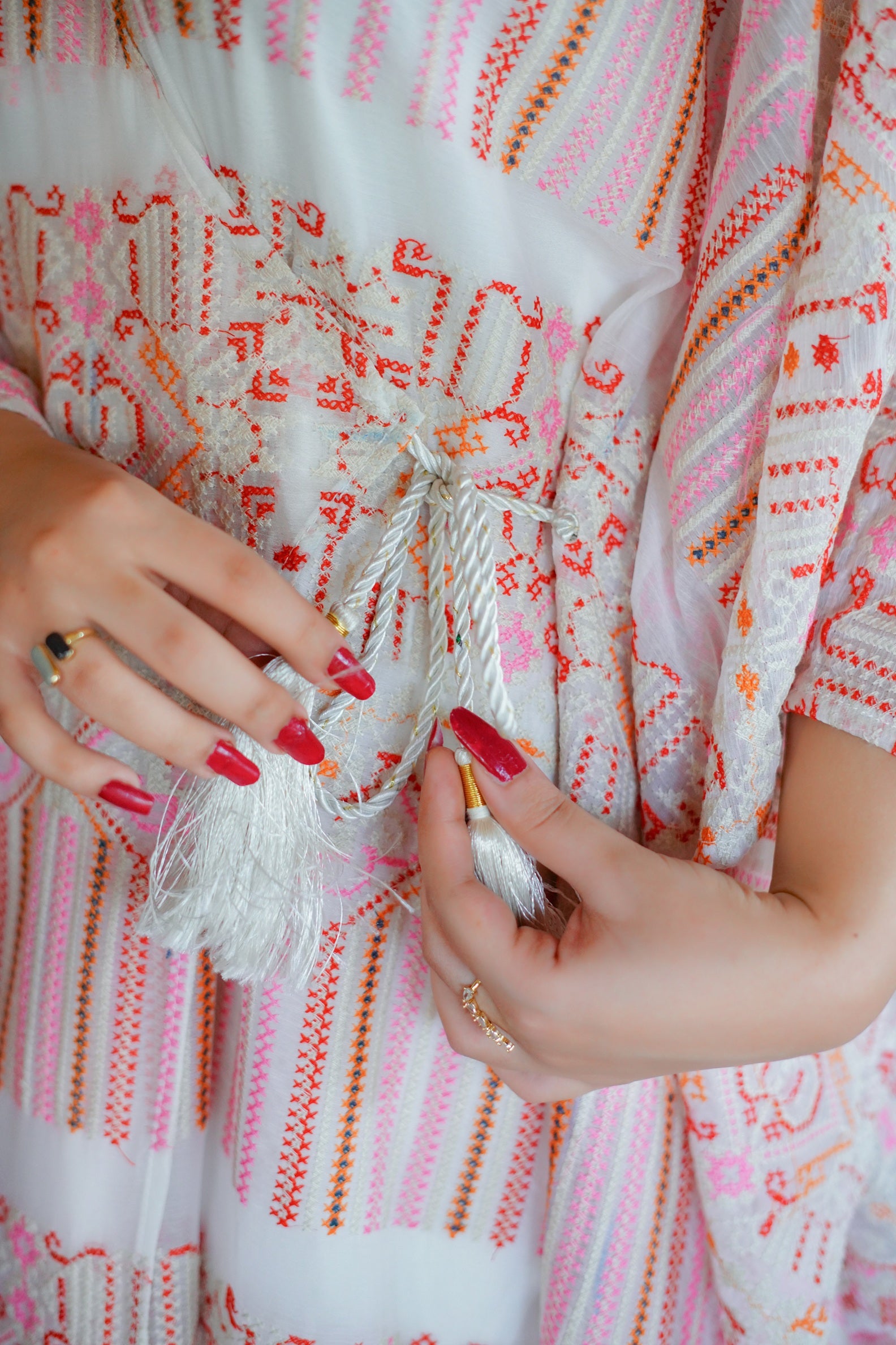 Elegant pink and white printed maxi dress for women – modern and modest outfit with intricate patterns, perfect for casual gatherings and festive occasions. Shop trendy and stylish women's dresses online.